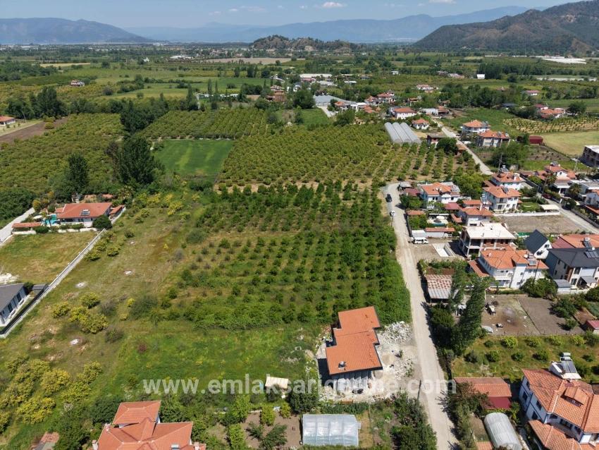 Land For Sale In Okçular, 1050m2, In The Village Residential Area.