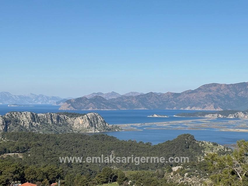 Gökbel'de Köy Yerleşik Alanı İçerisinde Deniz Manzaralı 1000m2 Satılık Arazi