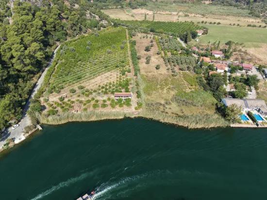 Köyceğiz Çandır Mahallesinde kanala sıfır 20.000m2 satılık tarla